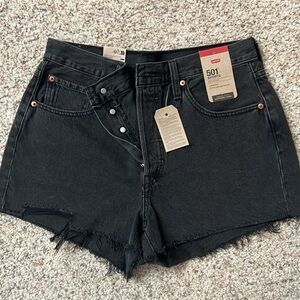 Brand new Levi’s ripped black shorts.